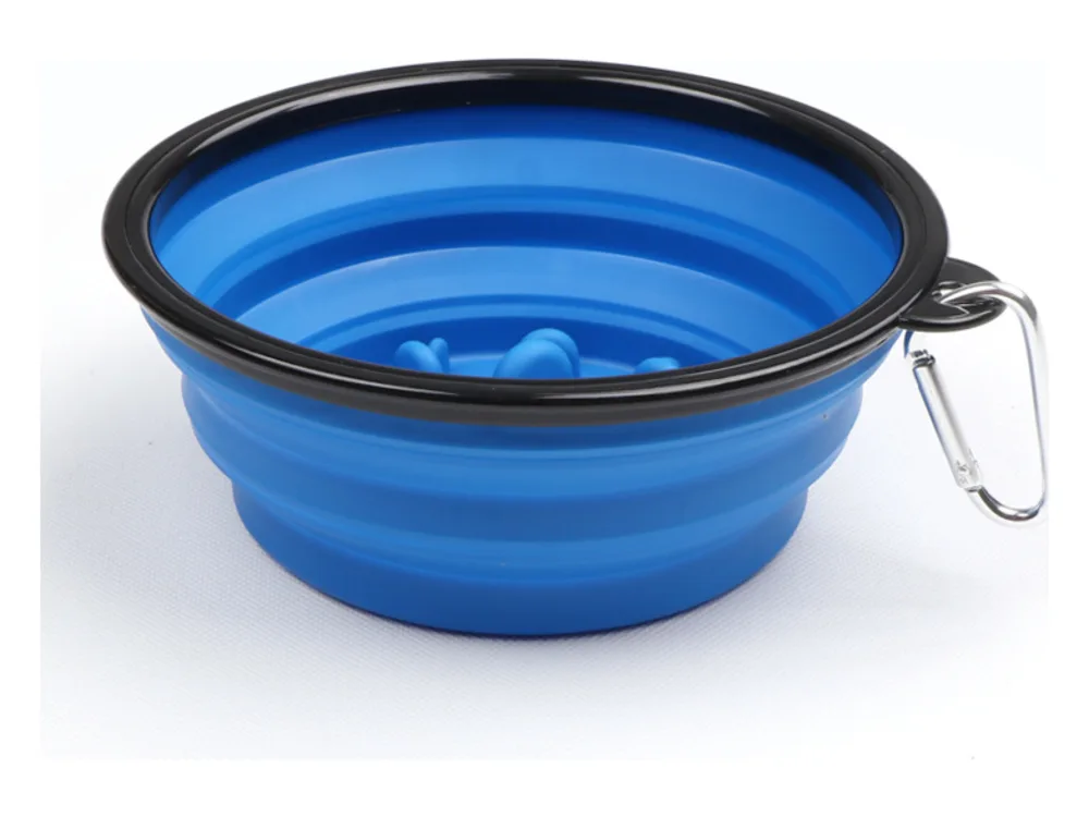 Blue collapsible silicone bowl with a black rim and a metal carabiner.