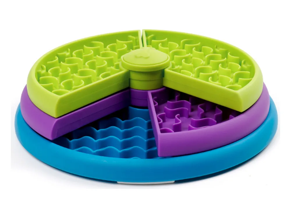 Round three-layer slow feeder bowl in green, purple and blue, shown from the side.