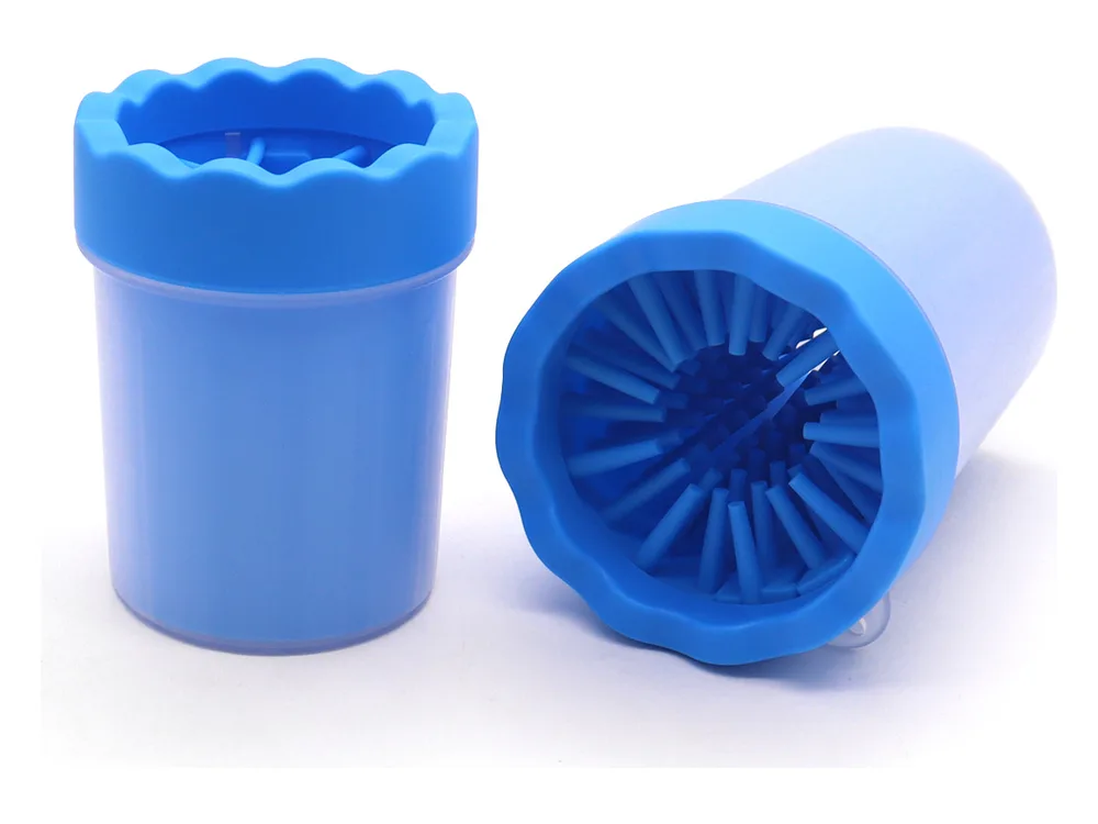 Two blue paw washer cups, one tipped to show the soft bristles inside.