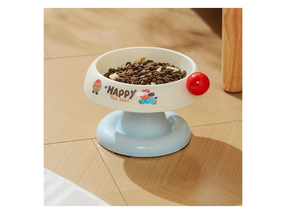 Cream raised bowl on a light blue stand with a stainless steel insert full of kibble.